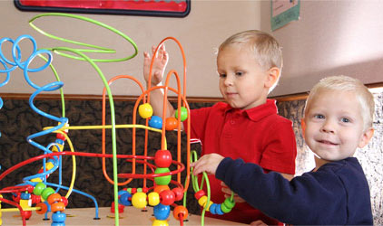 services-(1) Child in dentist chair receiving dental exam